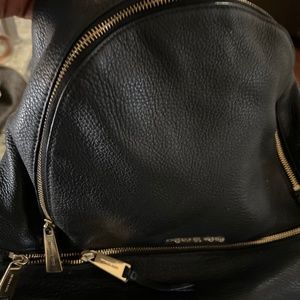Leather gently used backpack